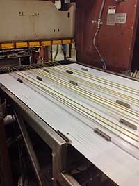 Conveyor and stacker